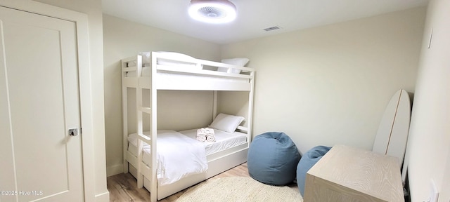 bedroom featuring light hardwood / wood-style floors