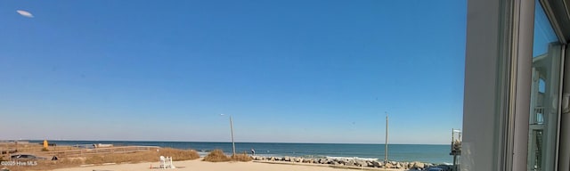 view of water feature featuring a beach view