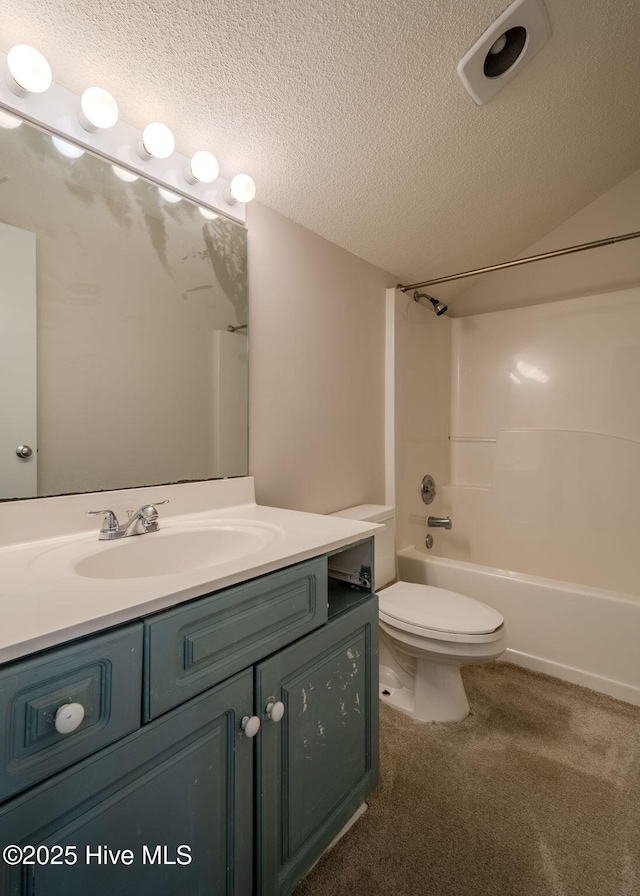 full bathroom with toilet, vanity, shower / tub combination, and a textured ceiling