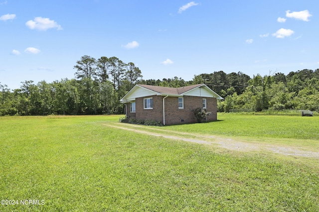 view of home's exterior featuring a lawn