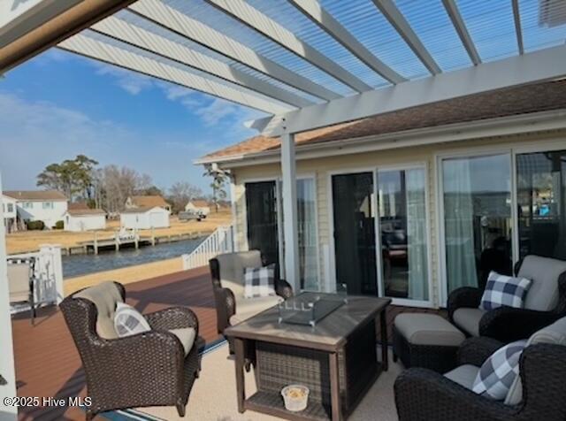 view of patio / terrace featuring a pergola and an outdoor hangout area