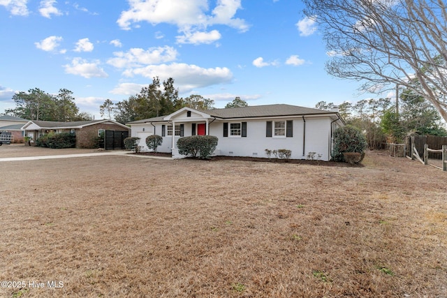 ranch-style home featuring a garage