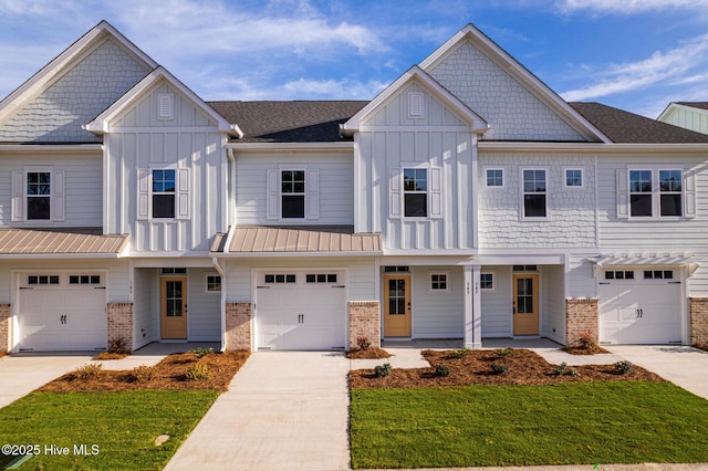 multi unit property with a front lawn, a porch, and a garage