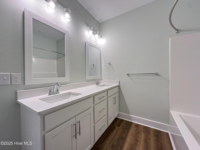 bathroom featuring hardwood / wood-style floors and vanity