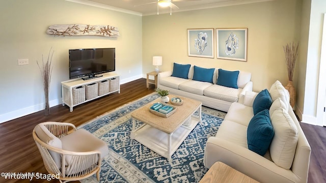 living room with ceiling fan, dark hardwood / wood-style flooring, and ornamental molding