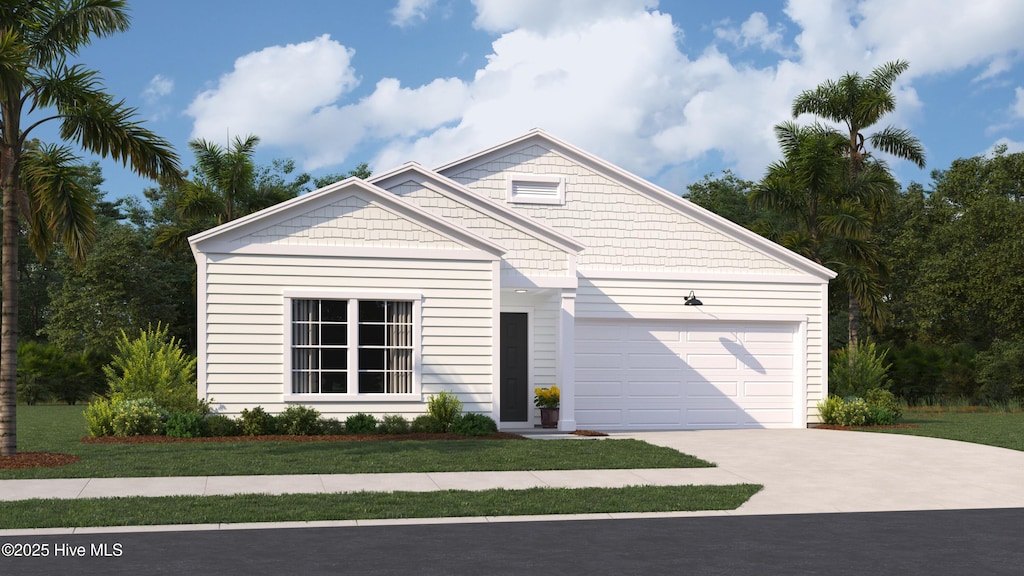 view of front of home with a front lawn and a garage