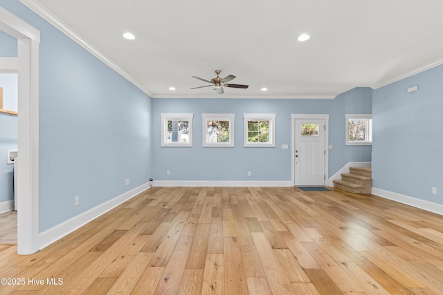 unfurnished living room with stairs, ornamental molding, light wood-type flooring, recessed lighting, and a ceiling fan