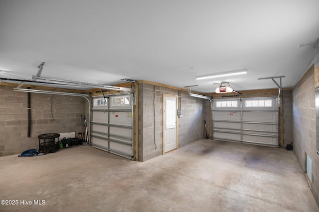 garage featuring a garage door opener