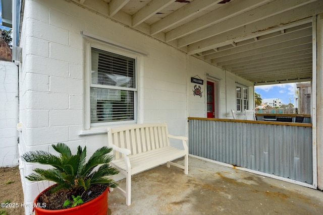 view of patio featuring a porch