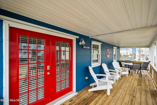 deck featuring covered porch