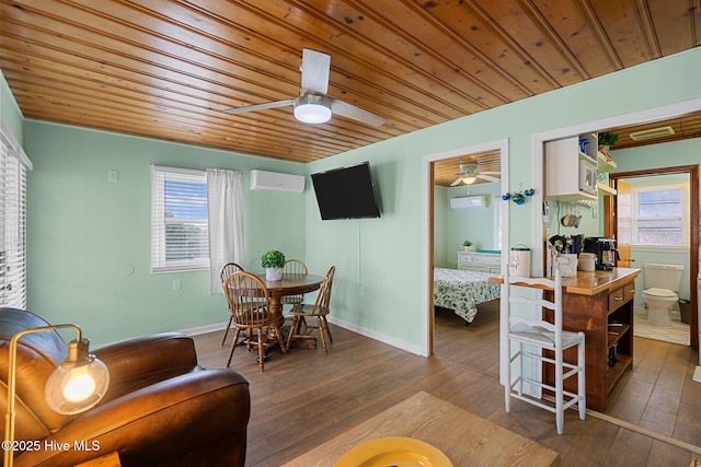 dining room with dark hardwood / wood-style floors, a wall unit AC, ceiling fan, and wood ceiling