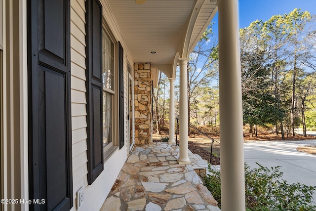 view of patio featuring a porch