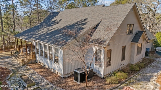 view of home's exterior with central AC unit