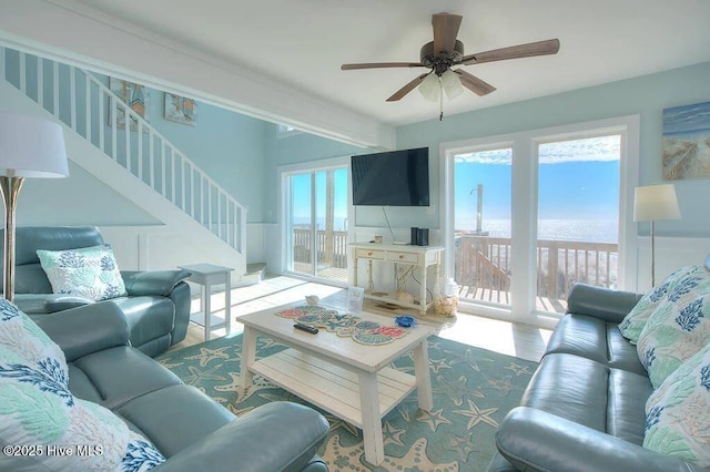 living room featuring ceiling fan