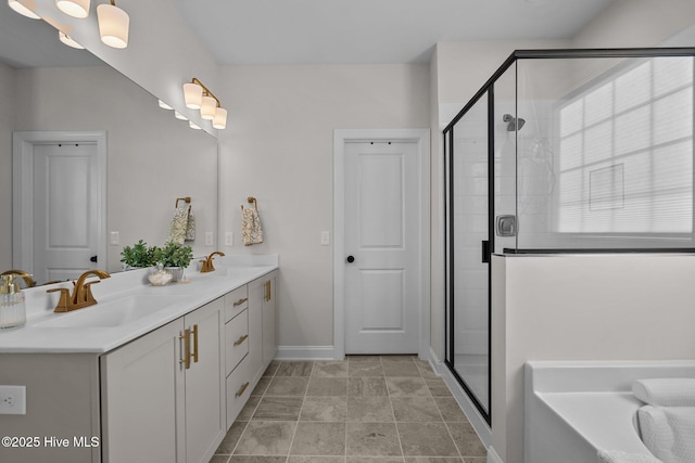 bathroom with vanity and separate shower and tub