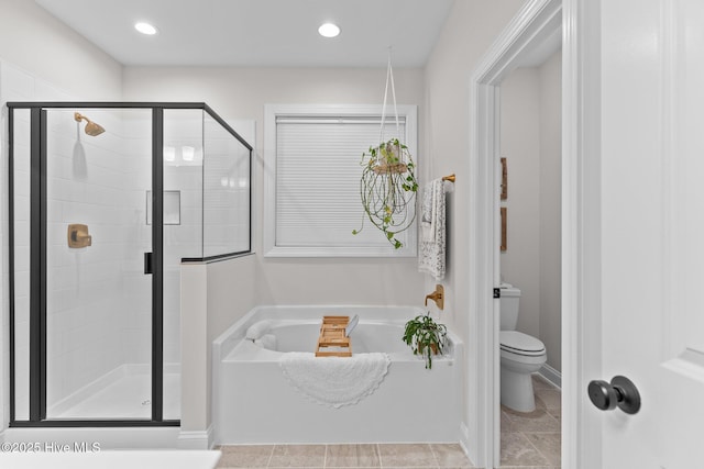 bathroom with separate shower and tub, tile patterned floors, and toilet