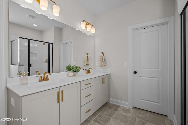 bathroom featuring vanity and walk in shower