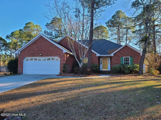 ranch-style house with a garage and a front yard