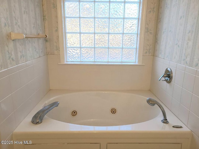 bathroom featuring a tub