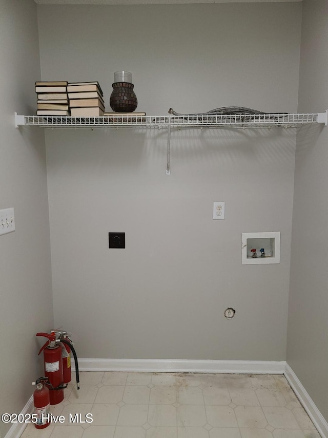 clothes washing area with electric dryer hookup and hookup for a washing machine