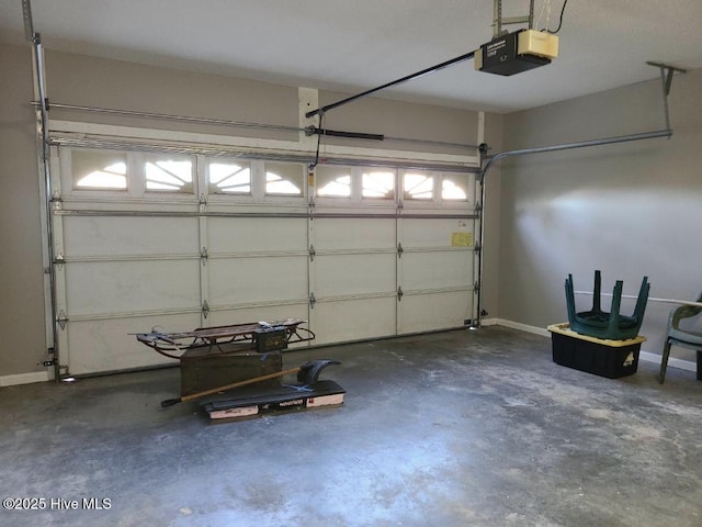 garage featuring a garage door opener