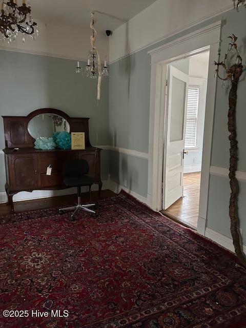 bedroom featuring a chandelier