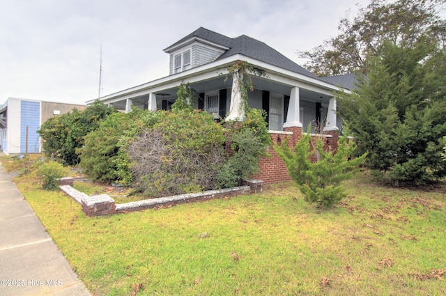 view of front of home with a front yard