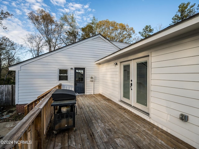 wooden terrace with grilling area