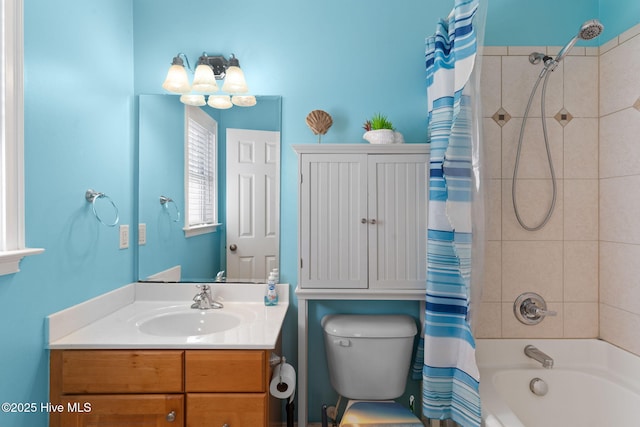 full bathroom with vanity, toilet, and shower / tub combo with curtain