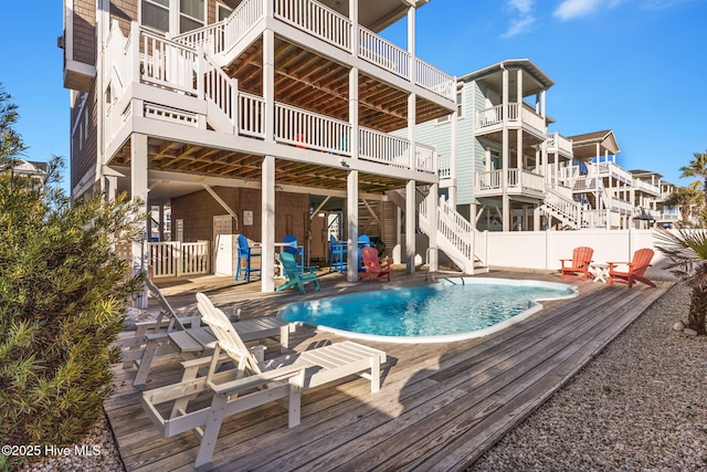 390 E Second St, Ocean Isle Beach, NC 28469 - view of pool featuring stairway, a deck, and a patio