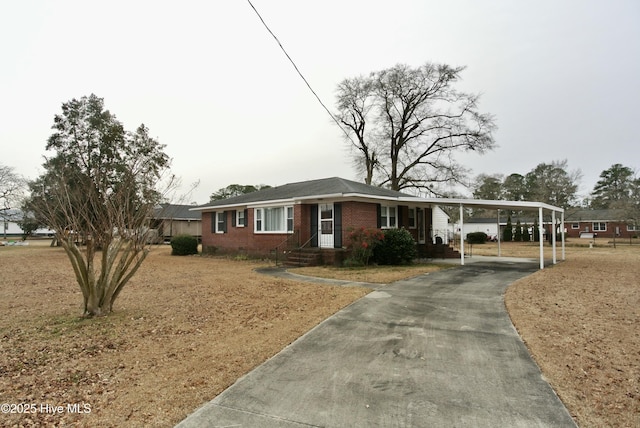 ranch-style house with a carport