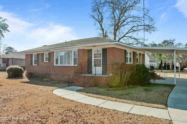 view of front of house featuring a carport