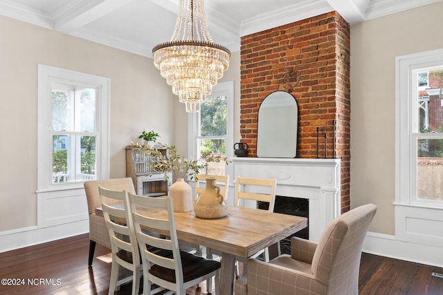 dining space featuring crown molding, coffered ceiling, a chandelier, beam ceiling, and dark hardwood / wood-style floors