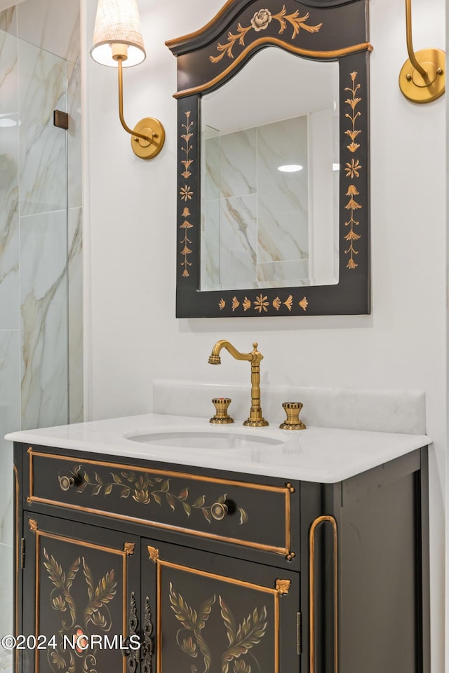 bathroom with a shower and vanity