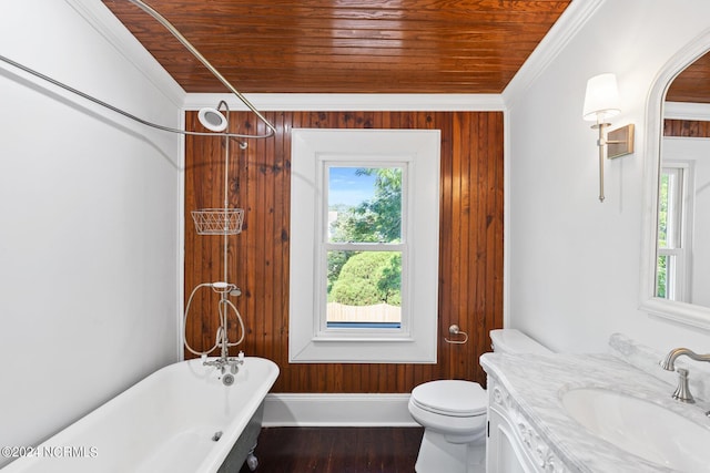 bathroom featuring vanity, toilet, ornamental molding, wooden ceiling, and a bathing tub