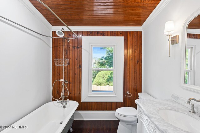 full bath with a freestanding tub, wood finished floors, toilet, and wooden ceiling