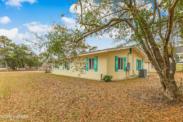 view of home's exterior with central air condition unit