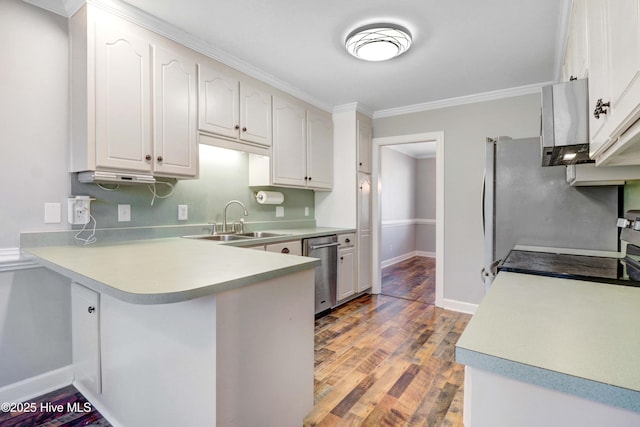 kitchen featuring dishwasher, sink, kitchen peninsula, white cabinetry, and wood-type flooring