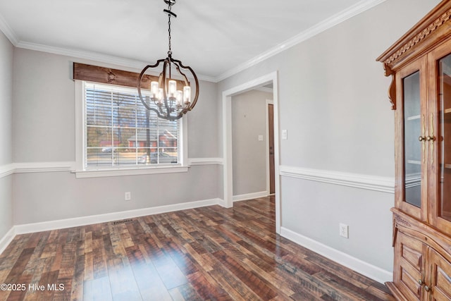 unfurnished dining area with a notable chandelier, dark hardwood / wood-style flooring, and crown molding