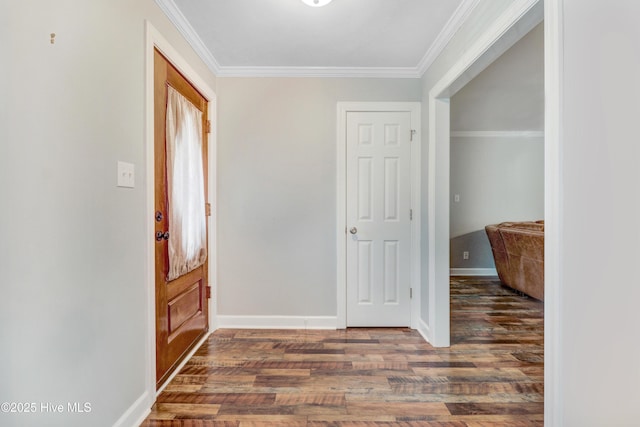 hall featuring dark wood-type flooring and crown molding