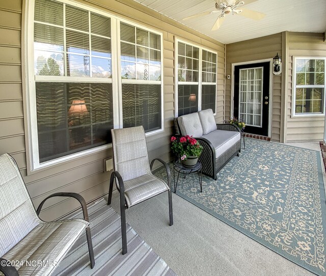 view of patio / terrace featuring a ceiling fan