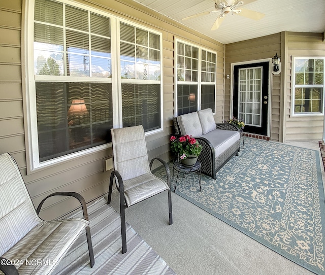 view of patio featuring ceiling fan