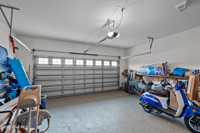 garage featuring a garage door opener