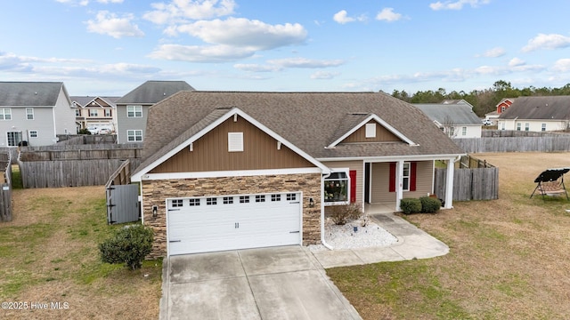 view of front facade with a garage and a front lawn