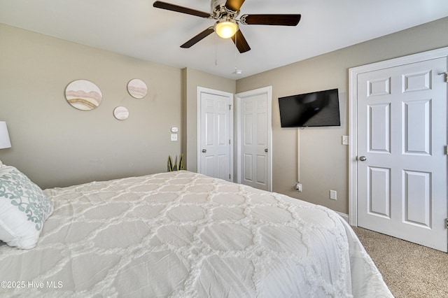 bedroom with ceiling fan and carpet flooring