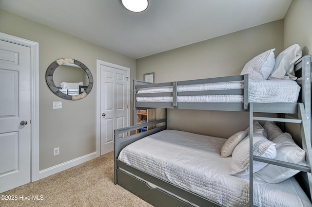 bedroom with light colored carpet