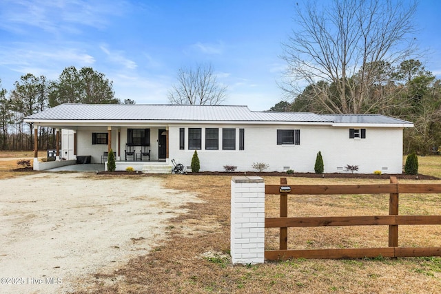 view of front of property featuring covered porch