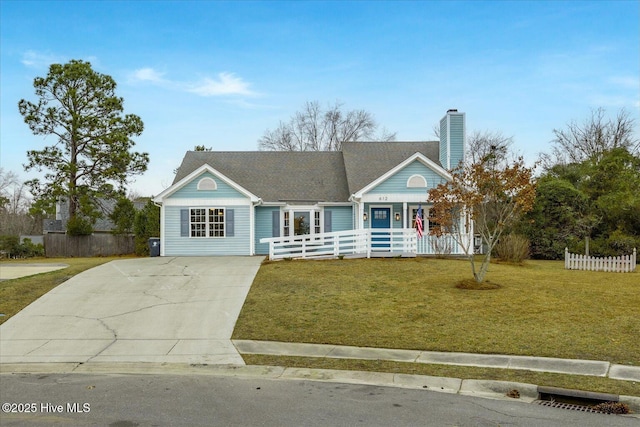 ranch-style home featuring a porch and a front yard