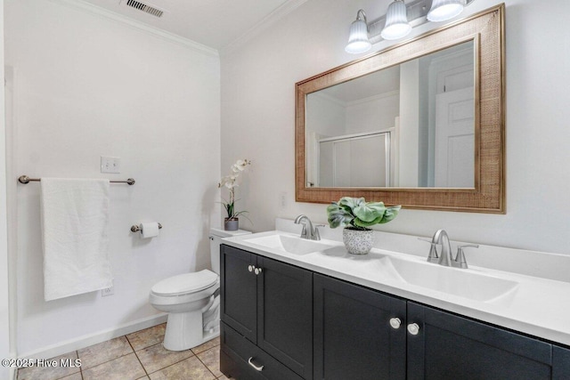 bathroom featuring a shower with shower door, tile patterned flooring, vanity, toilet, and crown molding