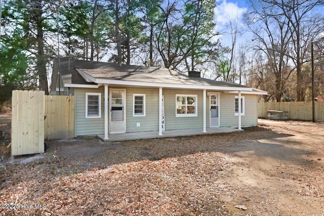 view of front of home with fence